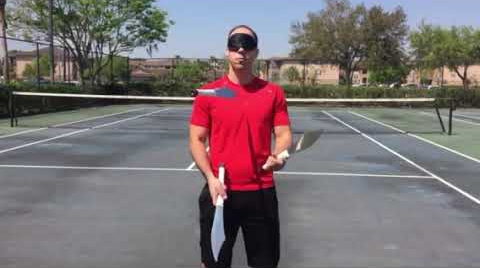 Juggling knives blindfolded